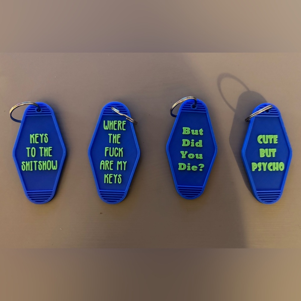 Blue Keychain Set with Humorous Text